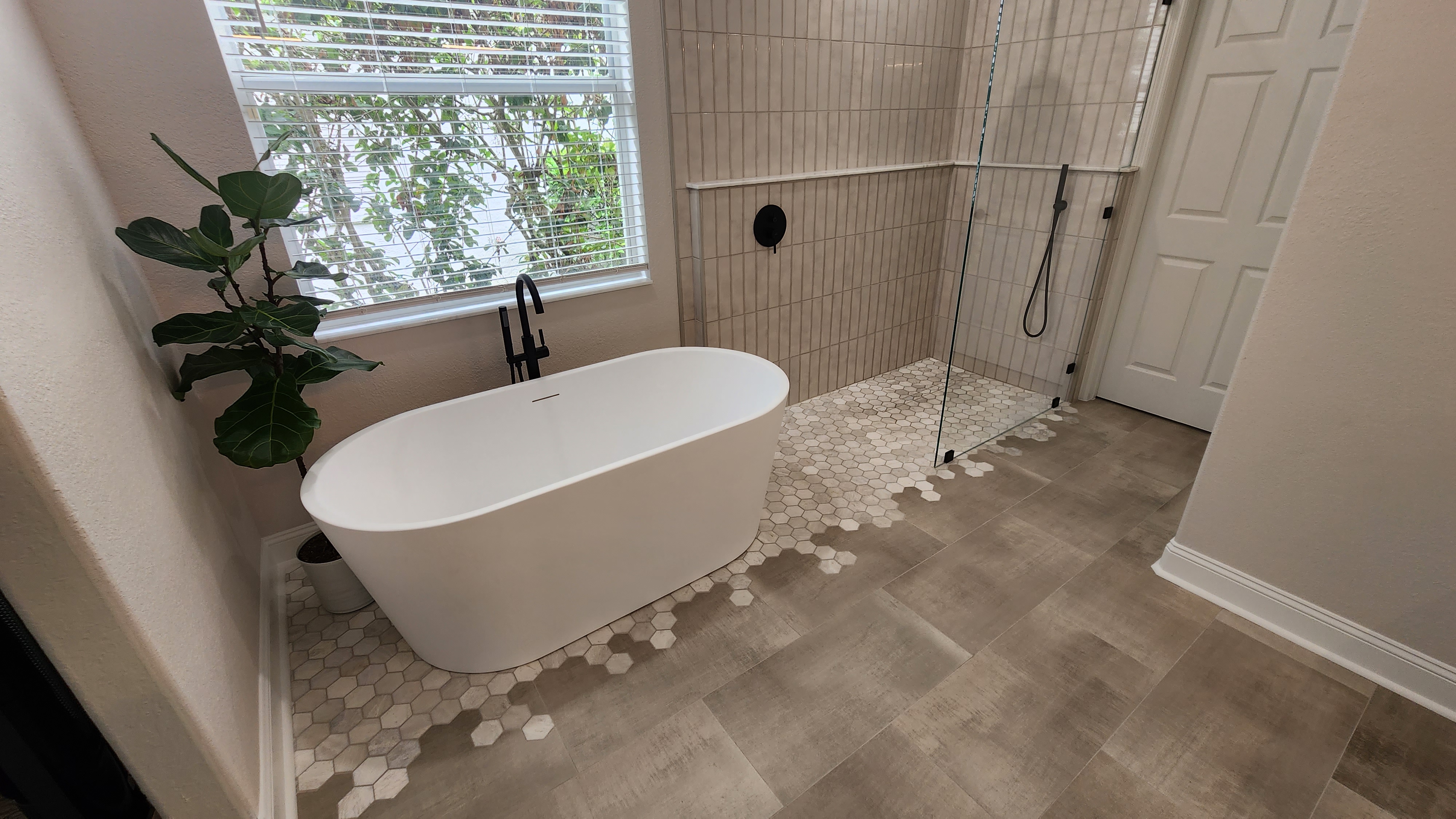 Guest bathroom with hexagon tile and double vanity